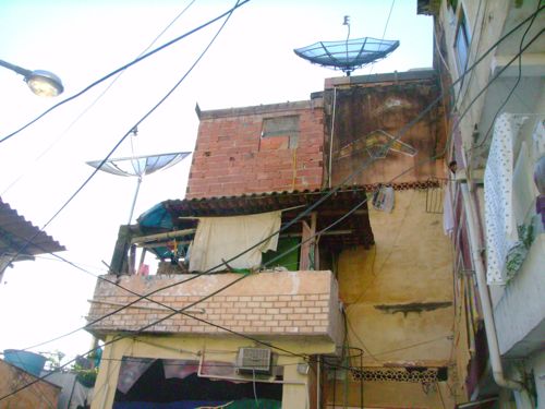 Satellite dishes can be found in the favela